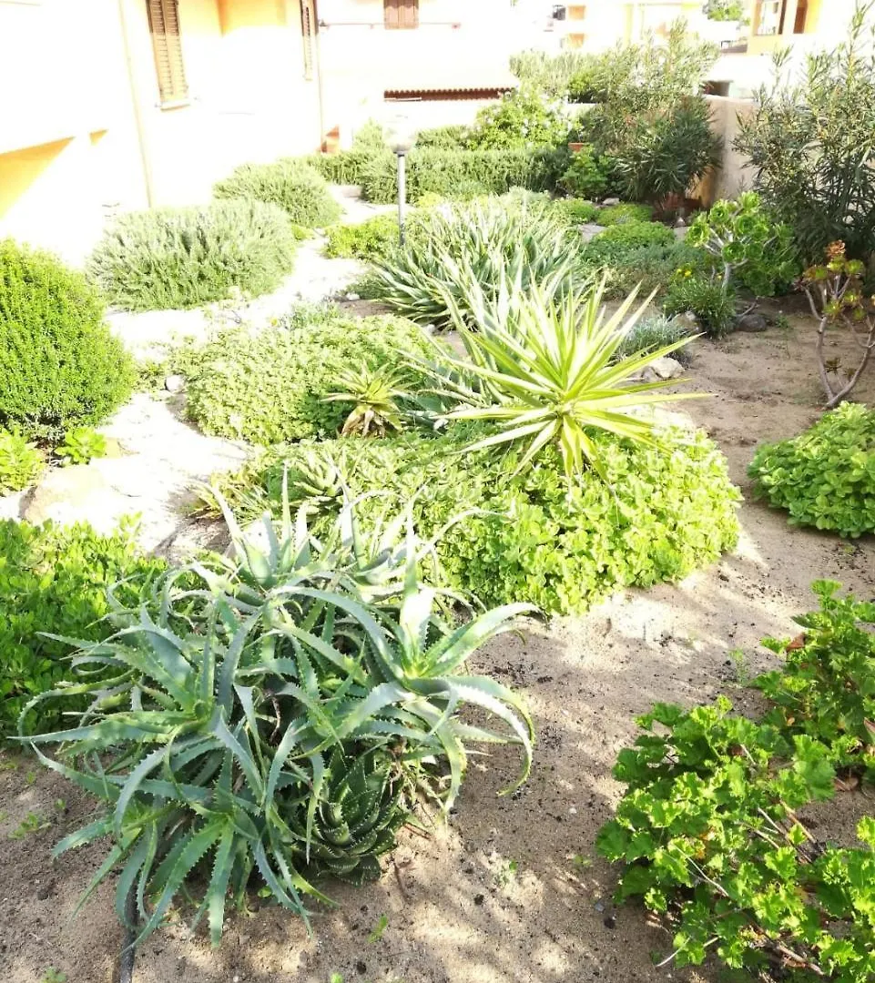 Gardenhouse Apartment Lu Bagnu Italy
